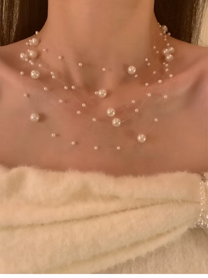 Elegant Multi-Strand Pearl Floating Necklace