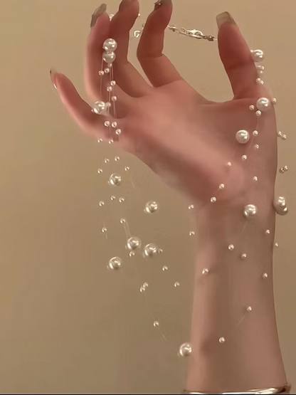 Elegant Multi-Strand Pearl Floating Necklace