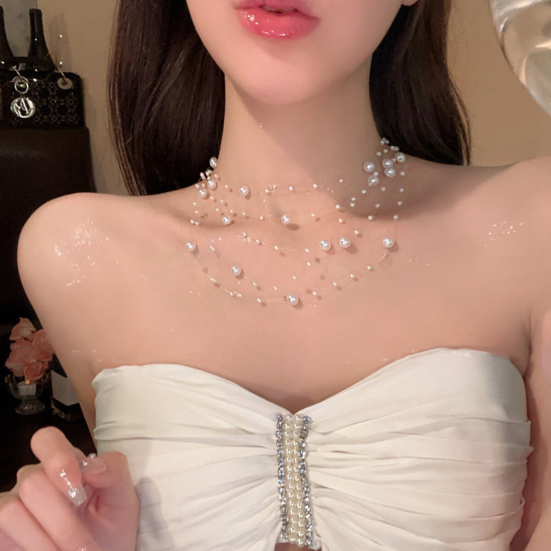 Elegant Multi-Strand Pearl Floating Necklace
