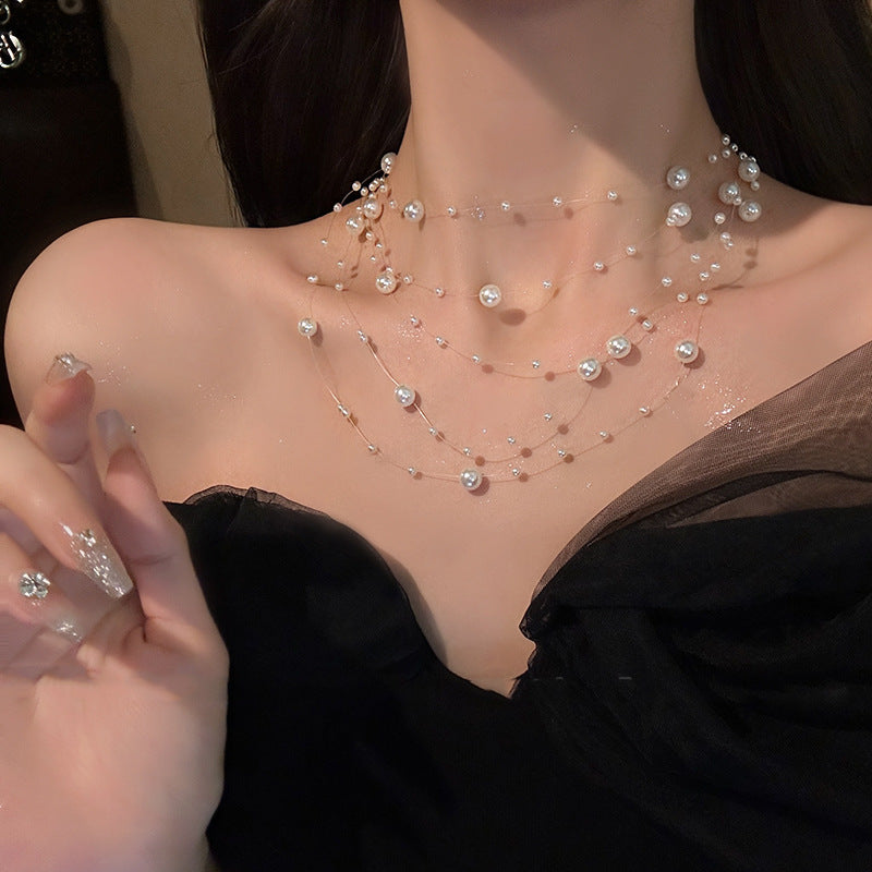 Elegant Multi-Strand Pearl Floating Necklace